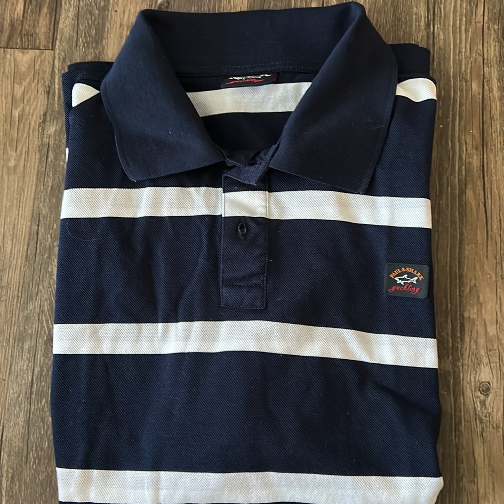 Blue and White Striped Polo Shirt with Classic Design